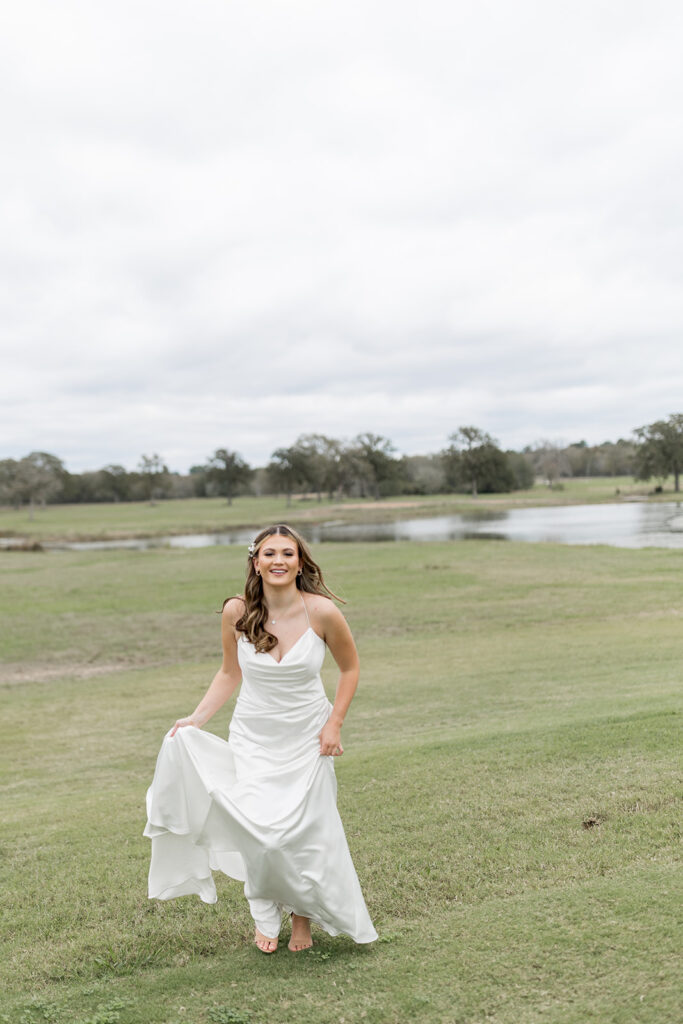 bride running in field