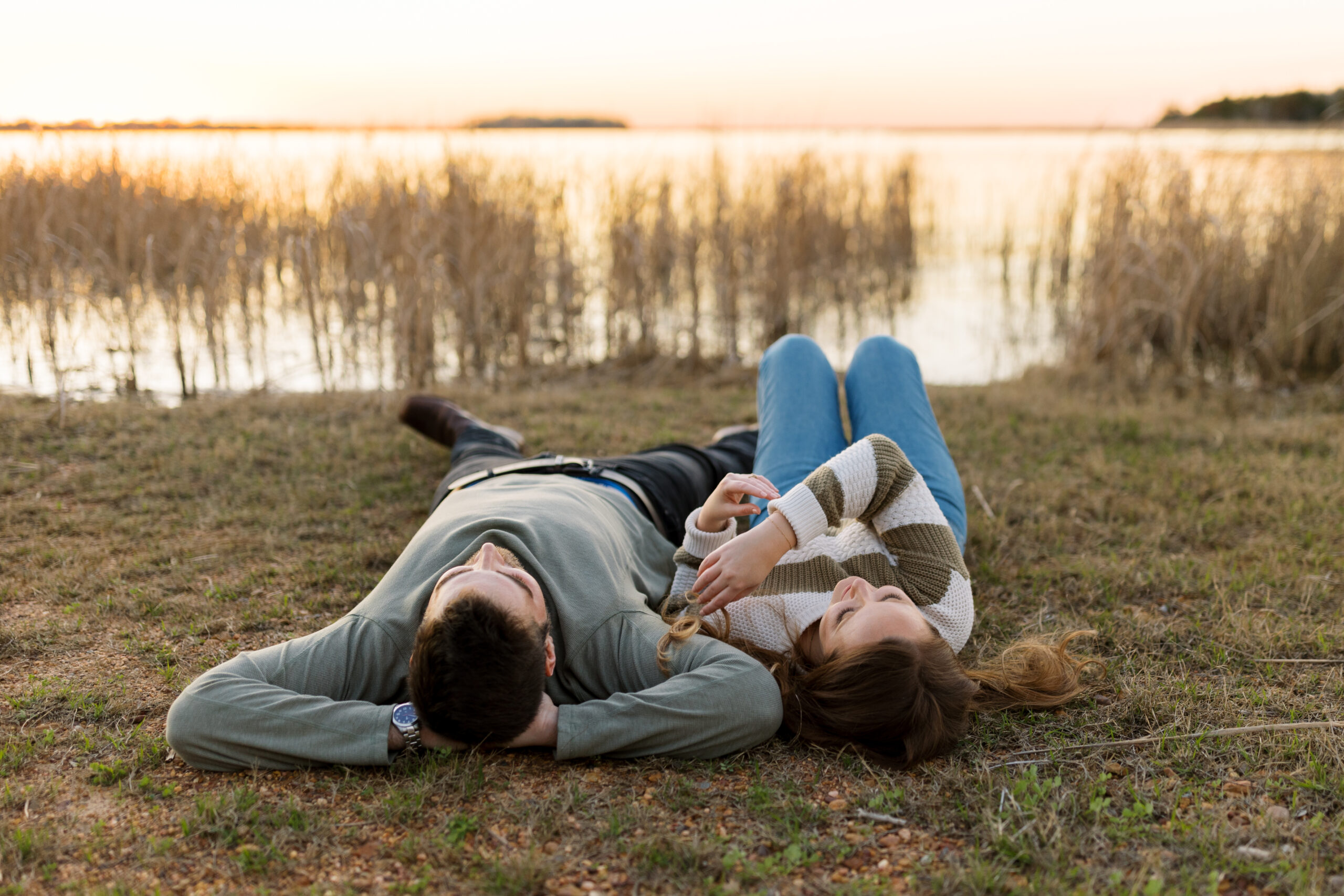 engaged couple looking at the sky in Bryan, Texas