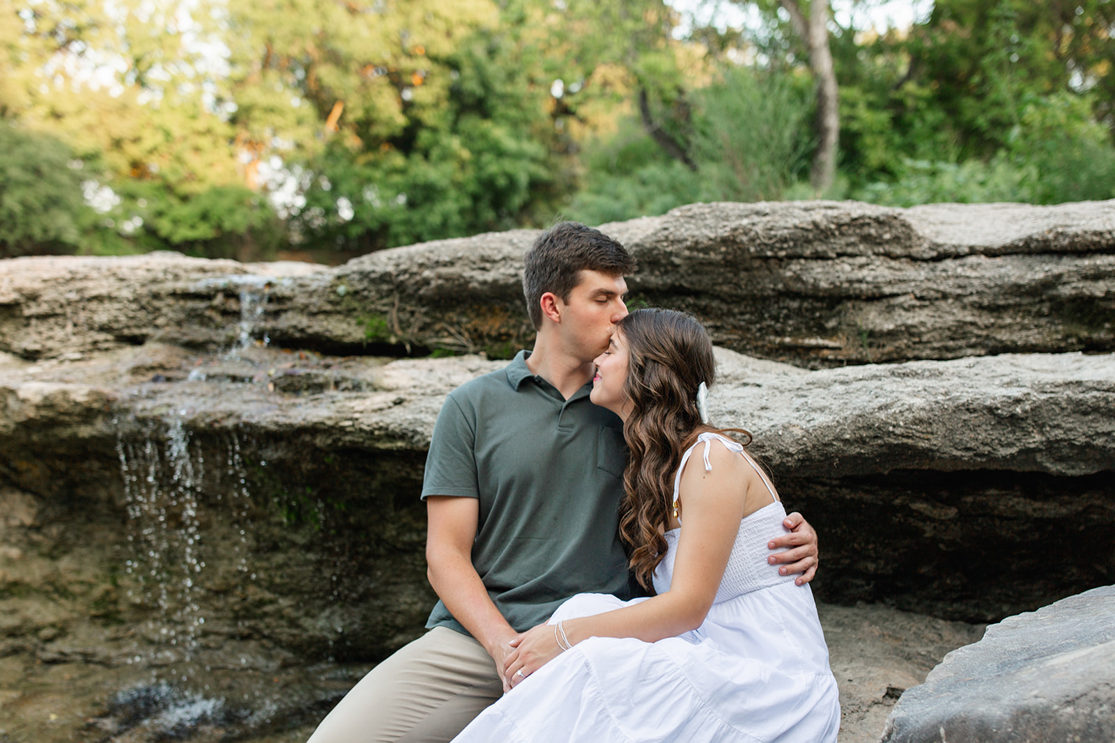 couple kissing during their engagement session in fort worth