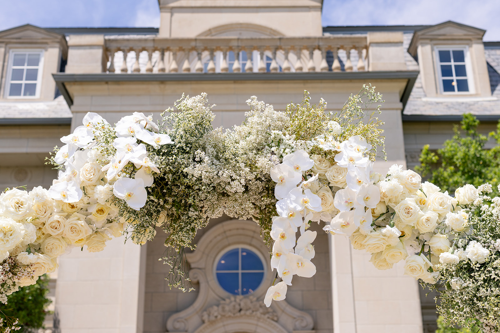 Floral arch in front of the Olana in Dallas Texas