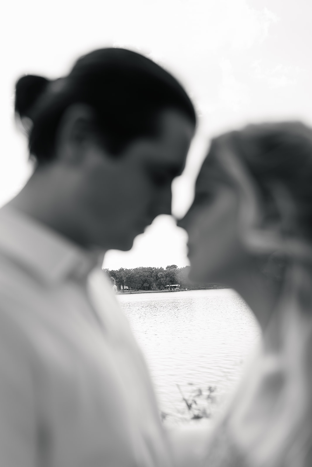 couple touching noses during a College Station Afternoon Engagement Session