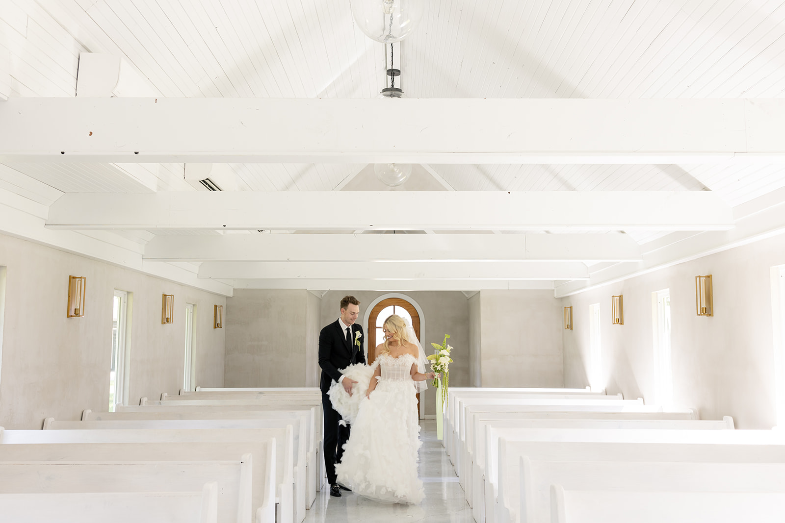 Bride and Groom inside the chapel at the Emerson Wedding Venue